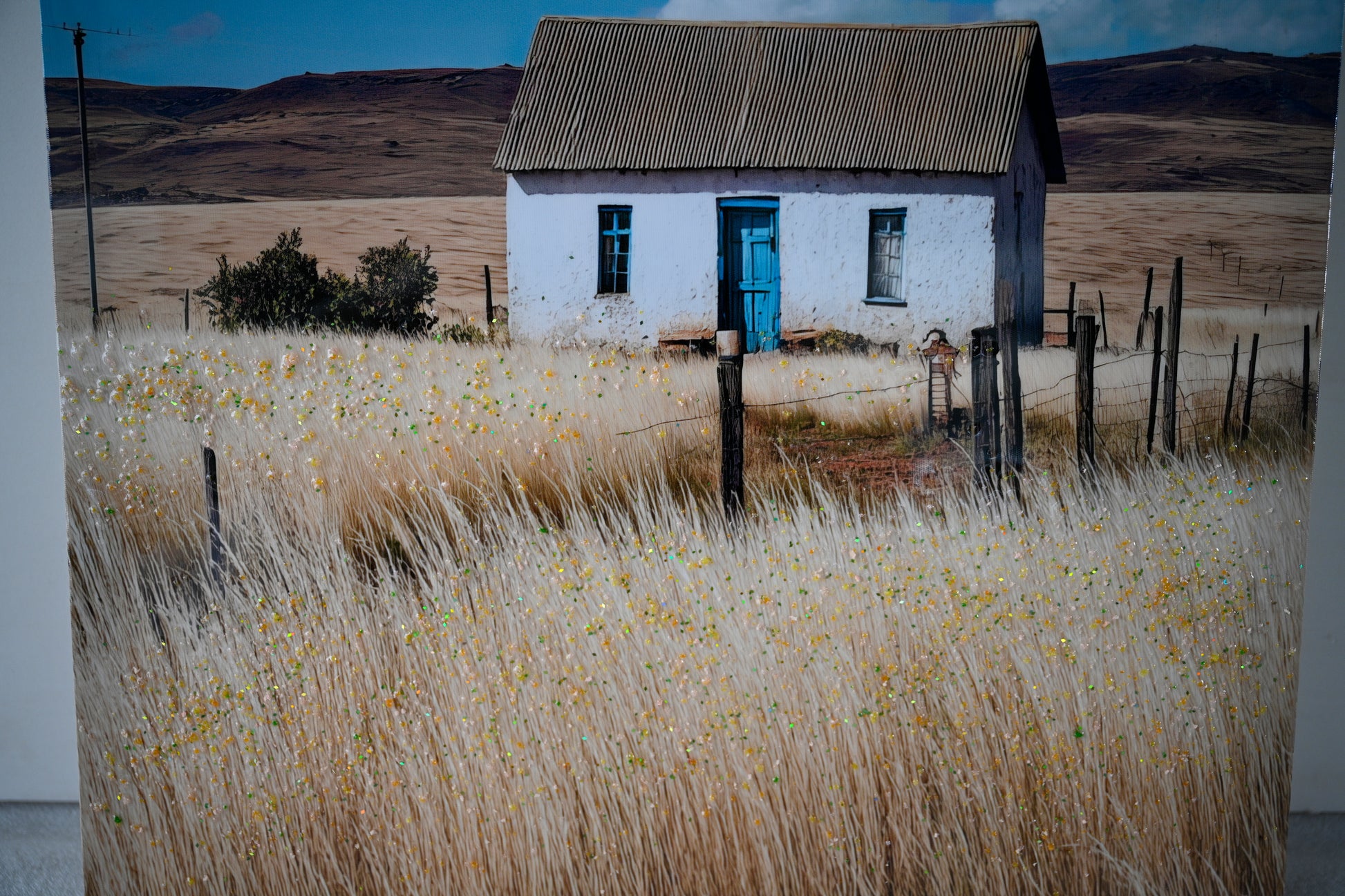 Vintage farmhouse canvas print with blue door and wooden fence