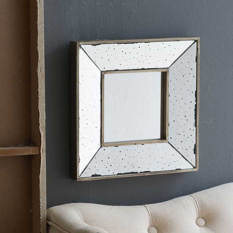 12x12 distressed silver square accent mirror on wall in living room