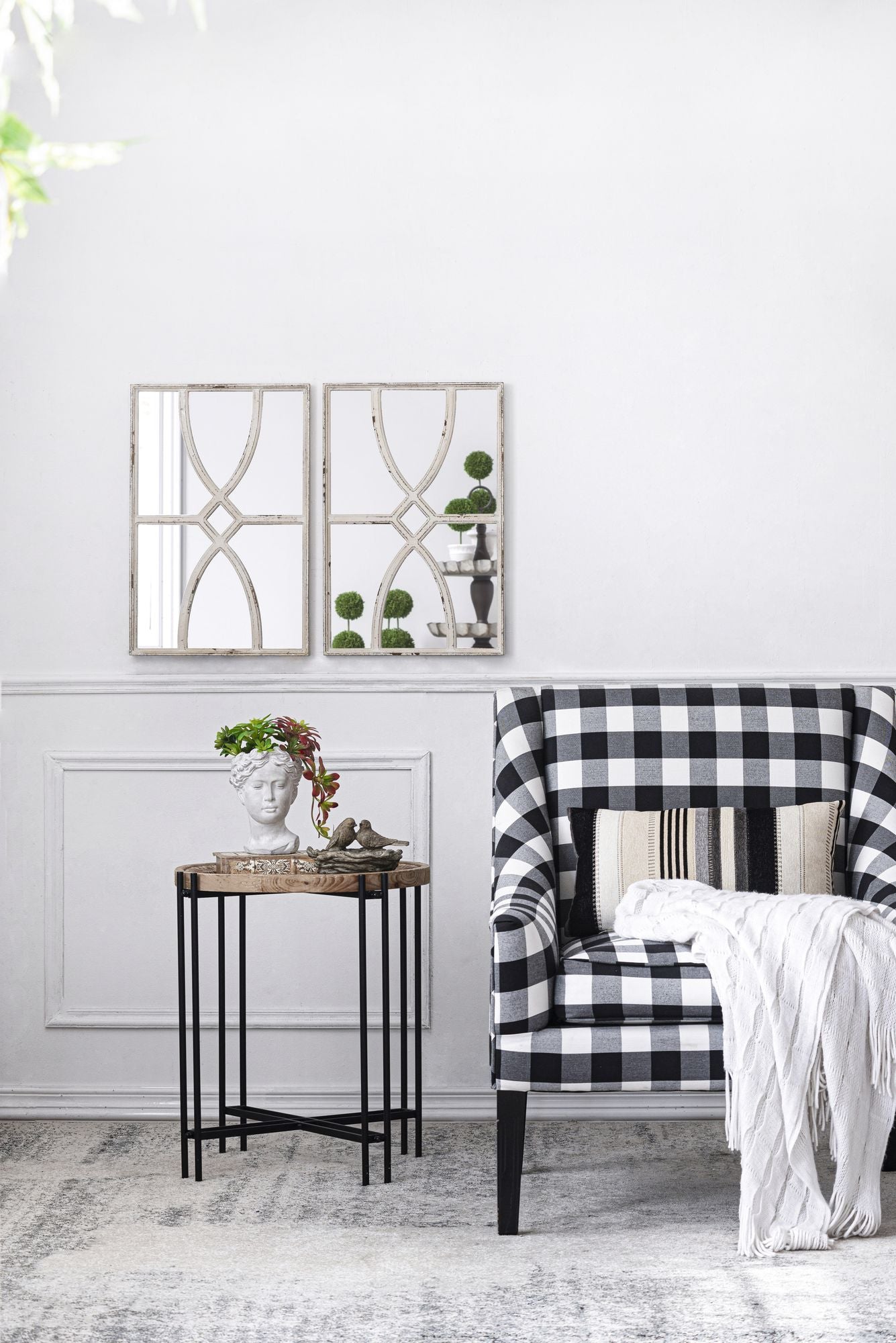 Distressed white finish detail on wooden mirror frame