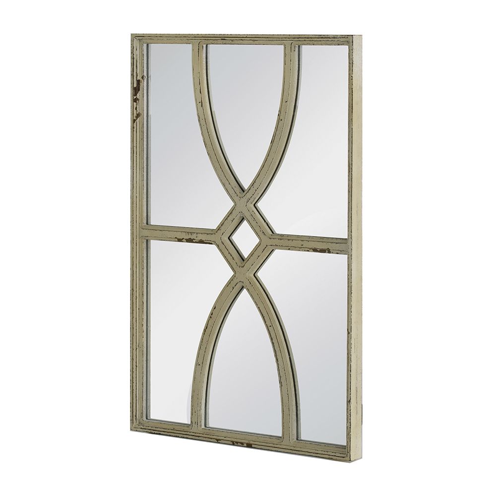 Close-up of distressed white frame on rectangular wall mirror