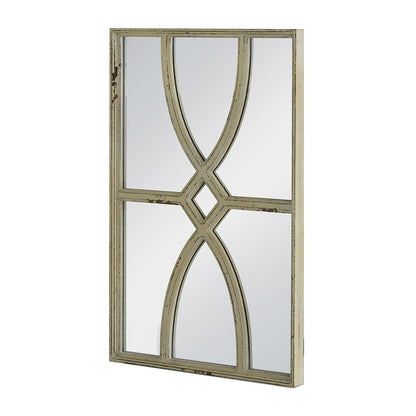 Close-up of distressed white frame on rectangular wall mirror