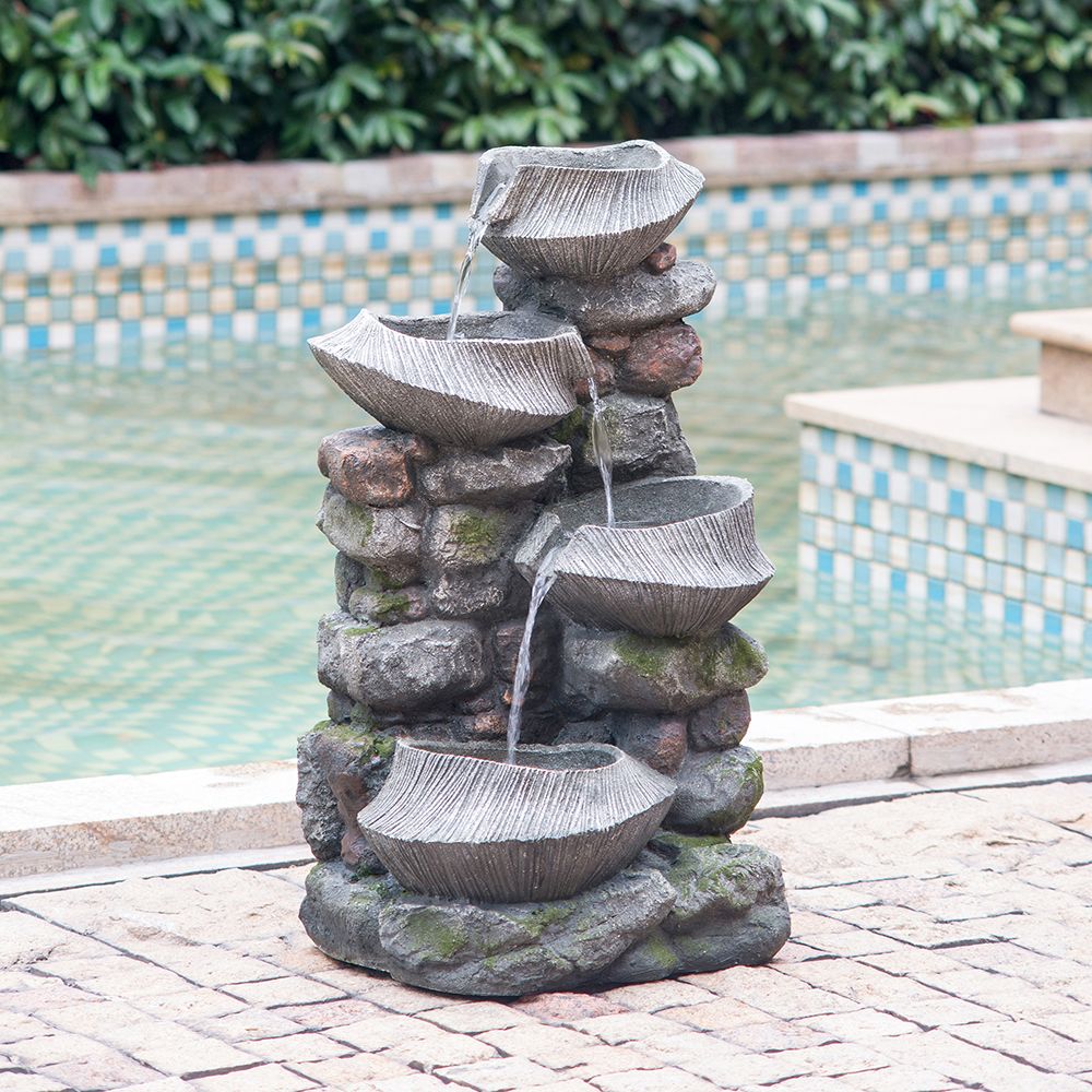 4-tier polyresin cascading rock water fountain with LED light - illuminated at night