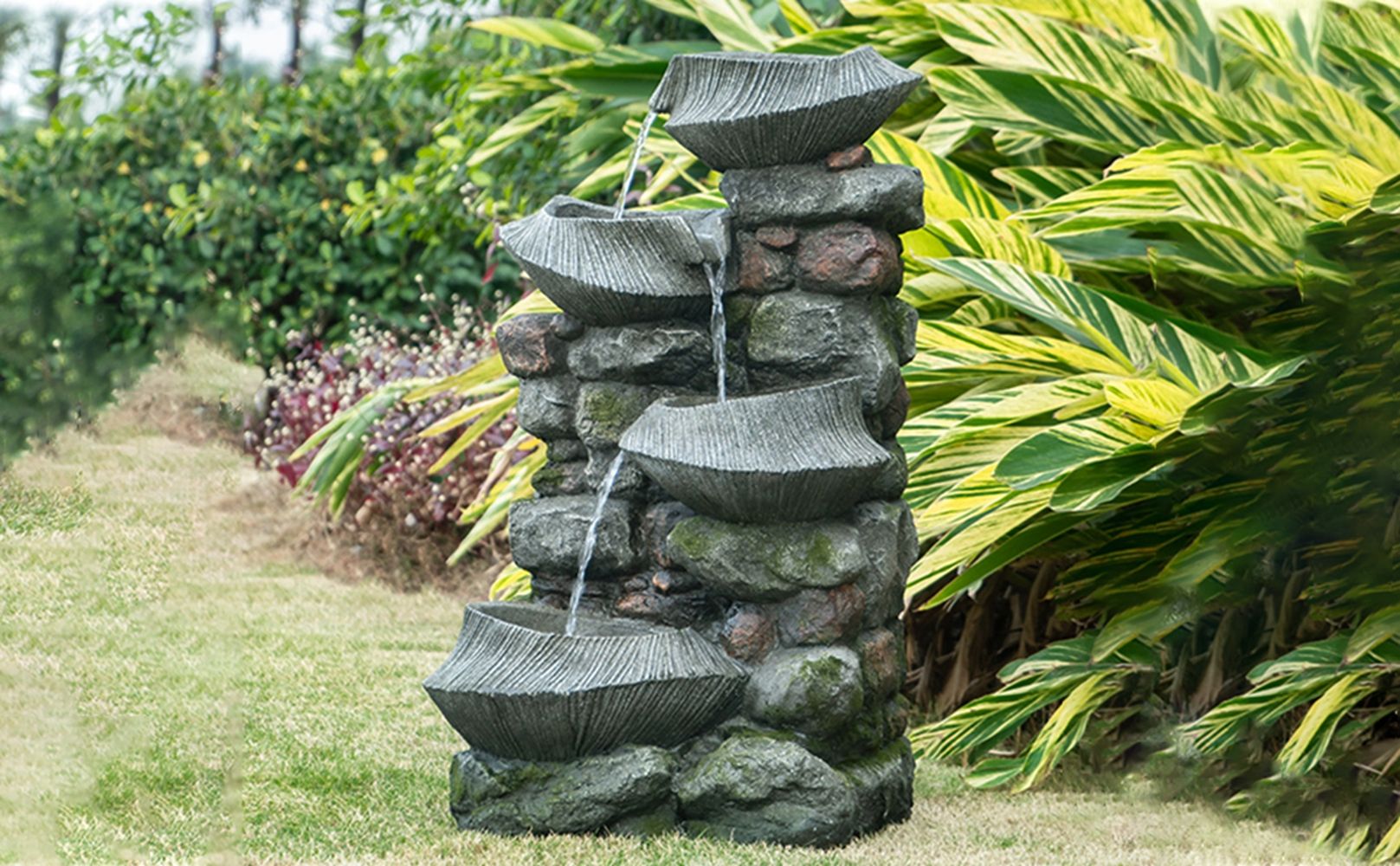 4-tier polyresin cascading rock water fountain with LED light - close up of rock texture