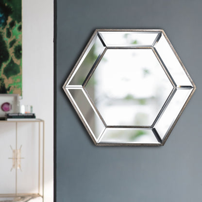 Hexagon mirror displayed horizontally on a wall