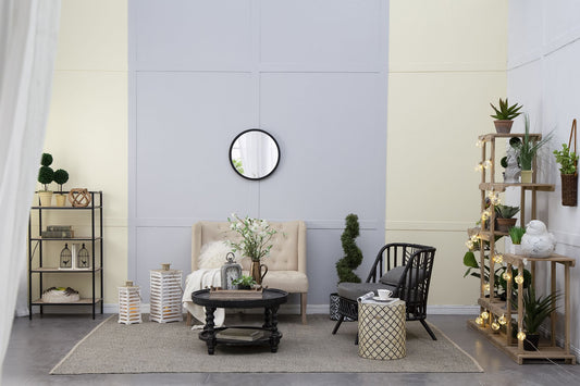 20 inch round wall mirror with black wooden frame on wall