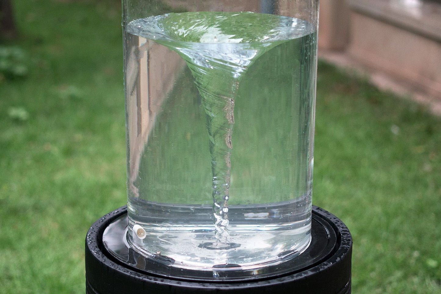 20x20x19.5 inch heavy cement round black ribbed outdoor water fountain with light - detail of ribbed texture