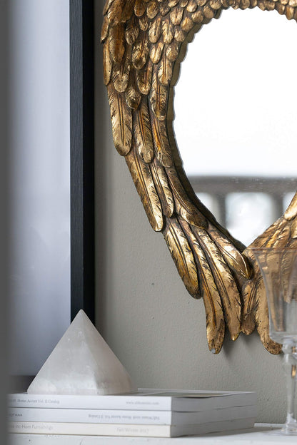 Golden wing mirror in office space