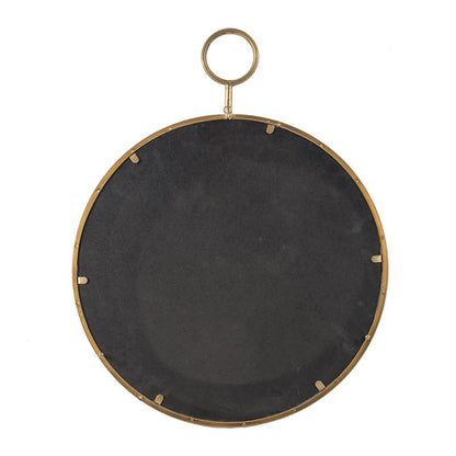 22x28 gold mirror reflecting light in bright room