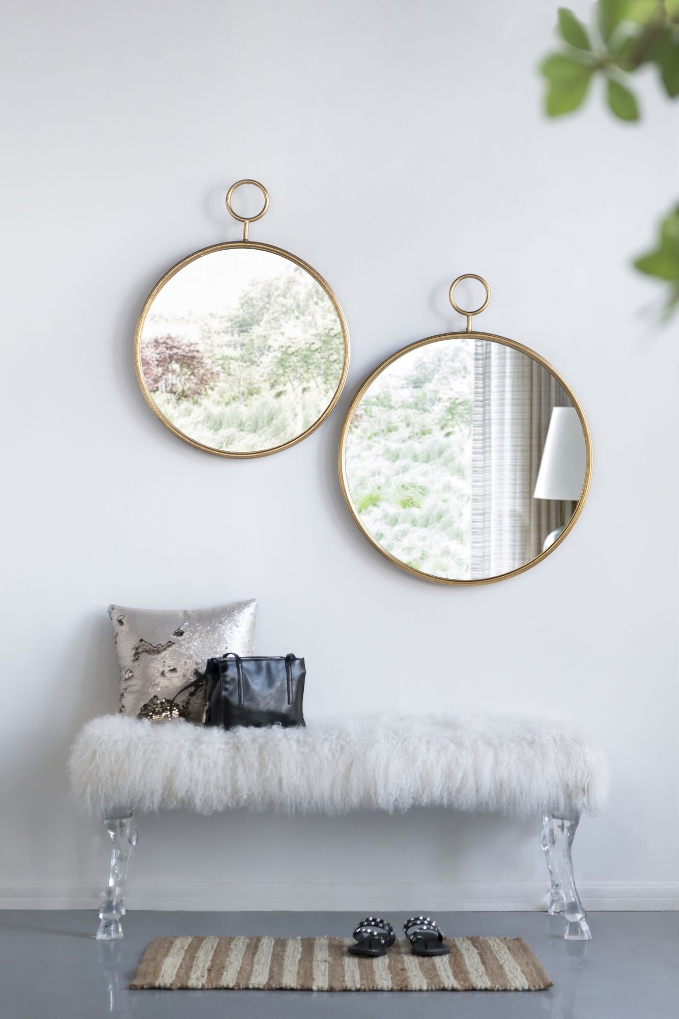 Gold circle wall mirror as home accent piece