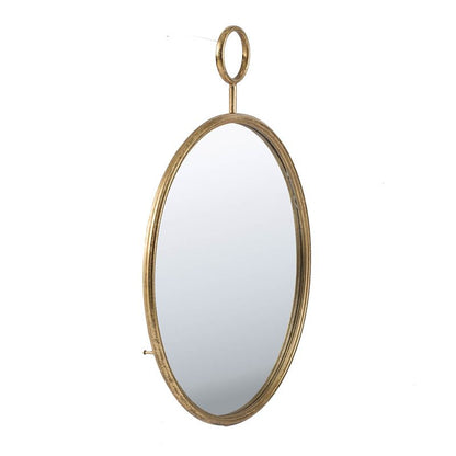 Circle wall mirror with gold frame in office decor