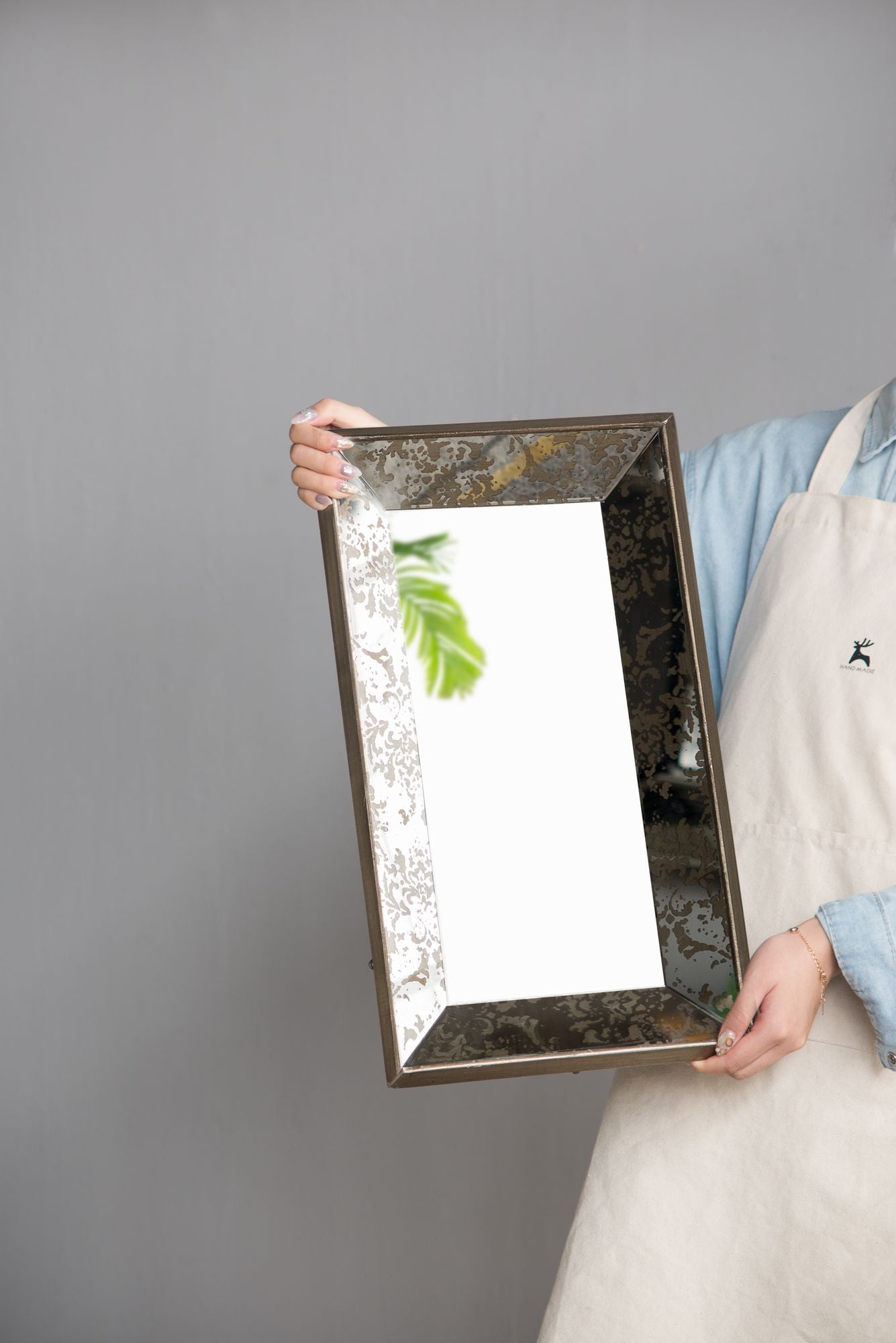 Mirror used as decorative tray with glasses and accents