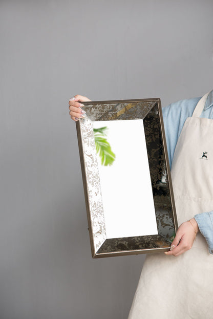 Mirror used as decorative tray with glasses and accents