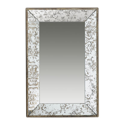 Antique silver mirror hanging in bathroom
