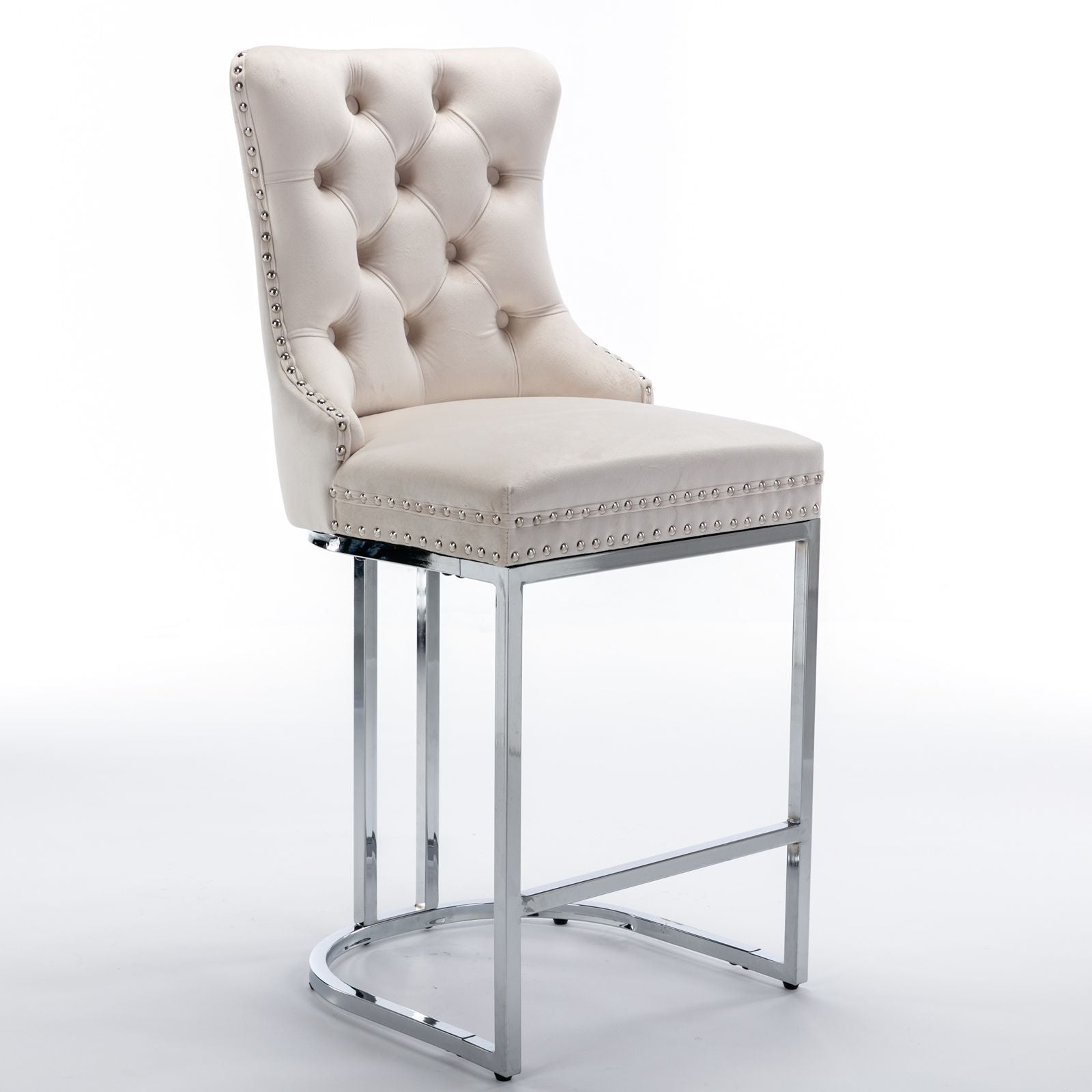 Close-up of button tufted backrest on beige velvet bar stool
