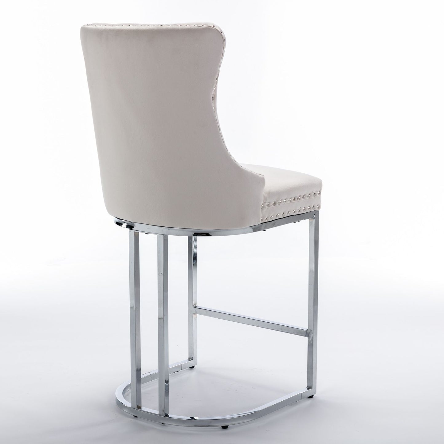 Decorative rivet trim detail on beige velvet bar stool cushion