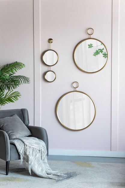 Mirror with gold frame in bedroom decor