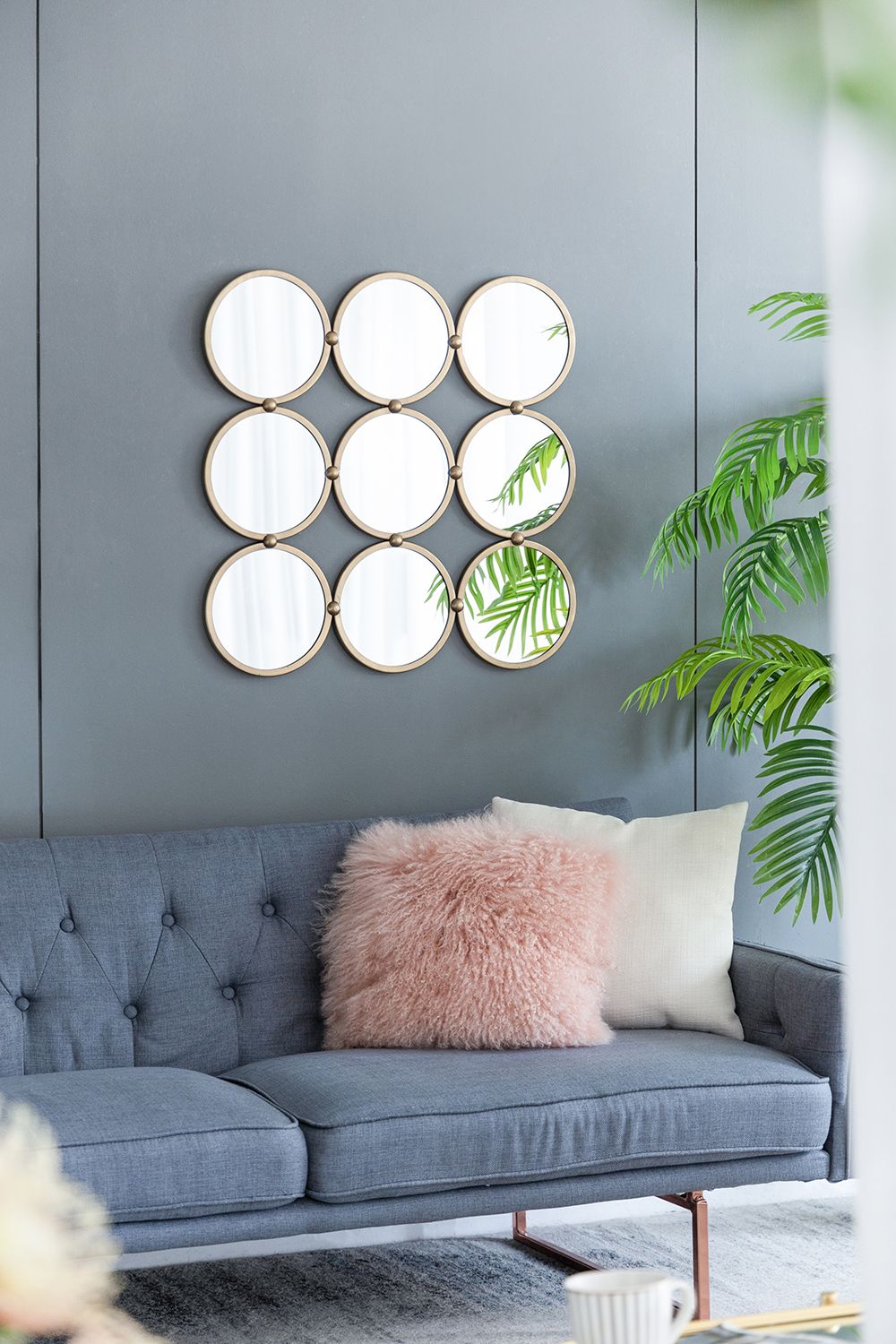 27.2 inch mirror with mid-century modern design detail