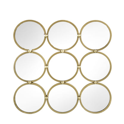 Decorative mirror reflecting light and patterns in room