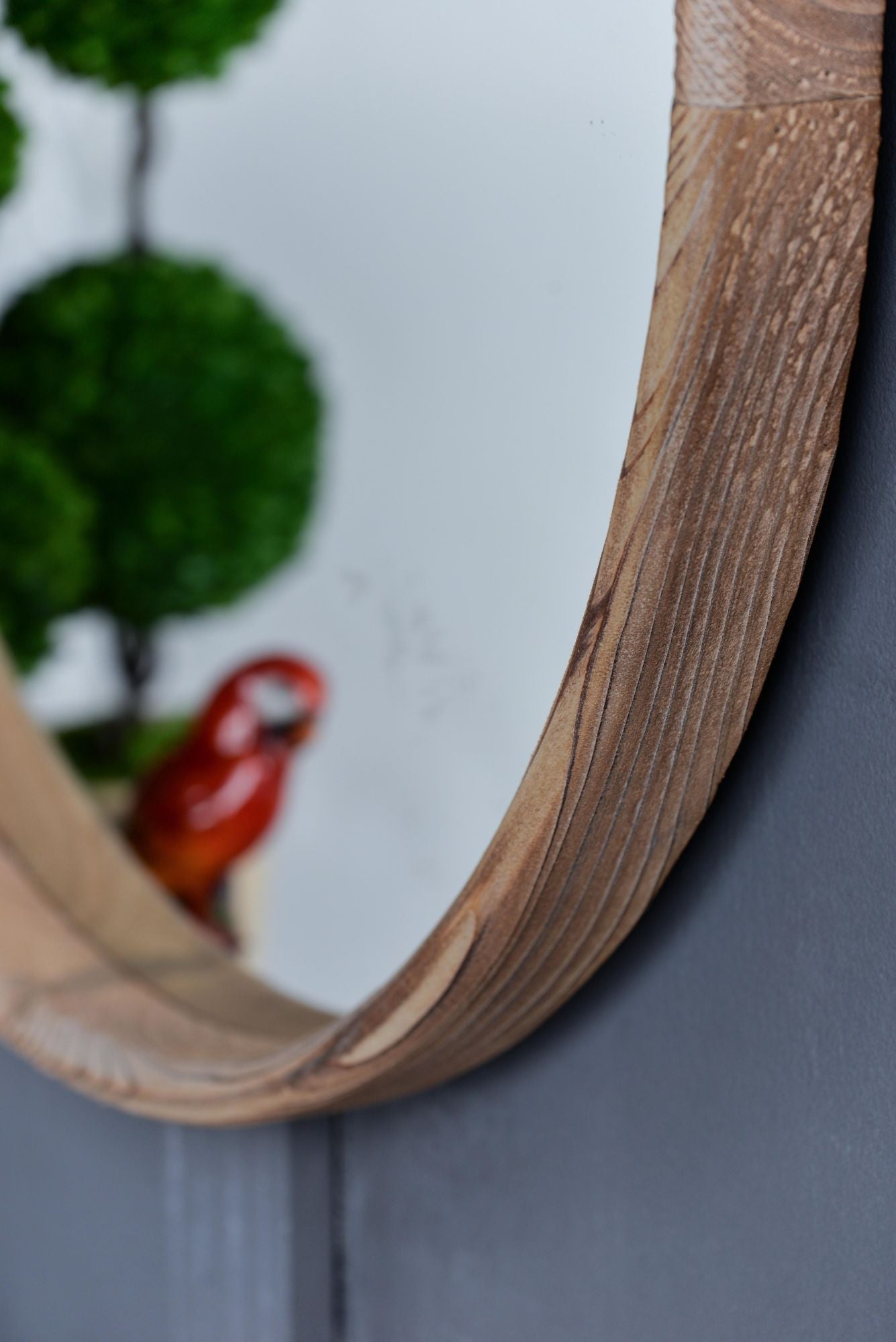 Round mirror with natural wood texture