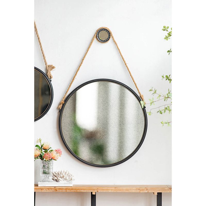29.5 inch hanging round mirror with black frame and rope strap - full room setting