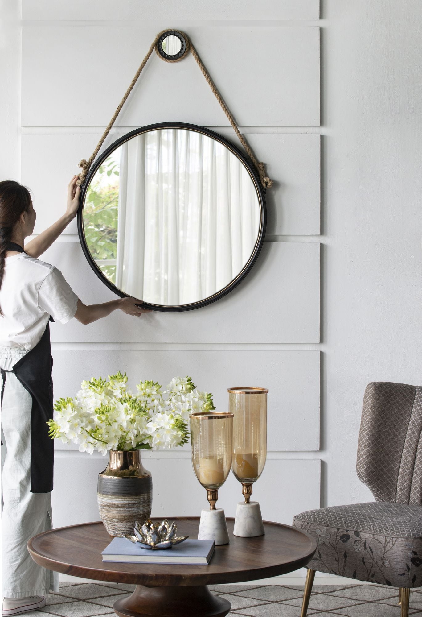 29.5 inch hanging round mirror with black frame and rope strap - side view
