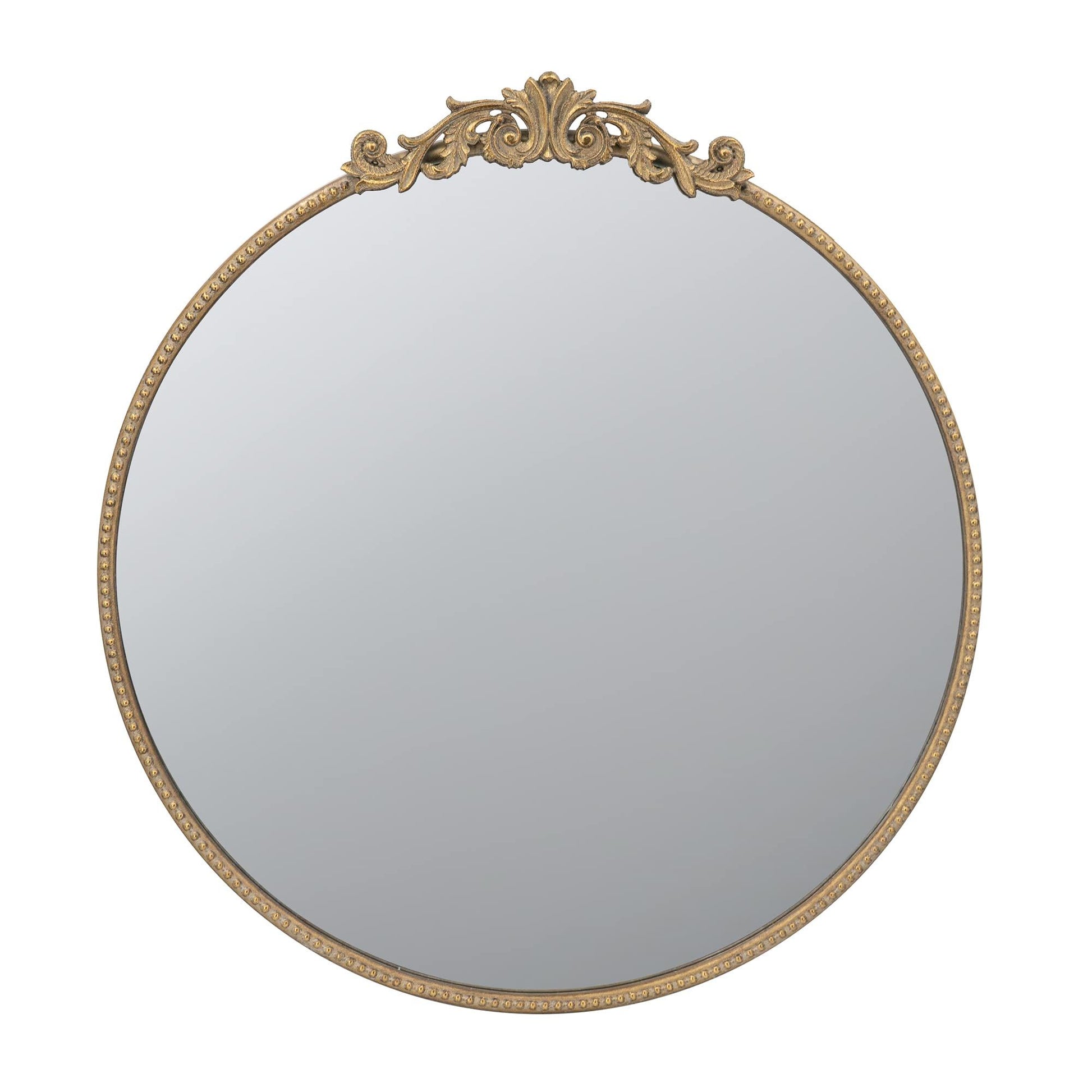 Close up of gold metal frame on round mirror