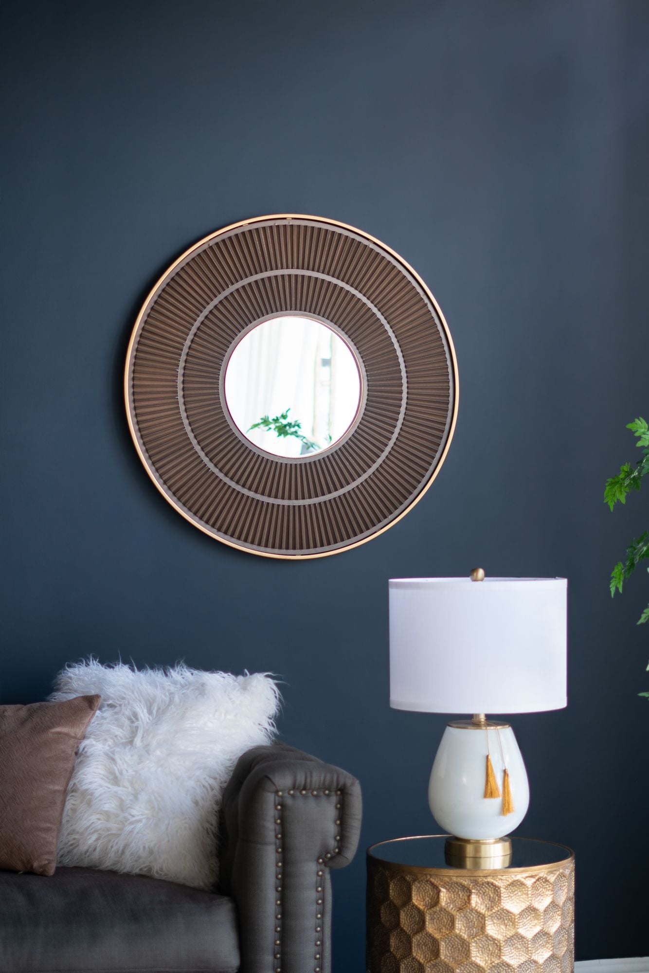Round Carter mirror in living room setting
