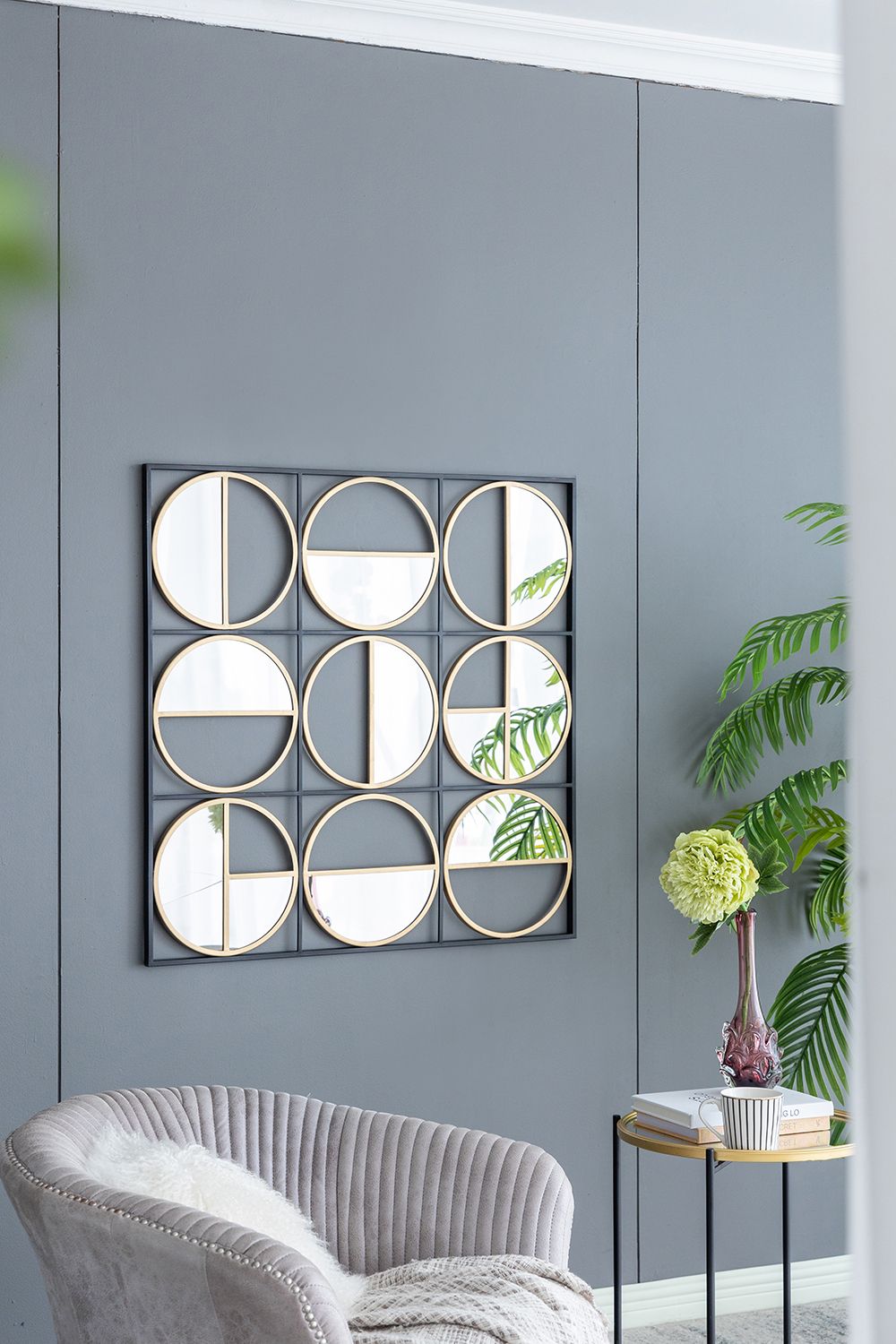 Eclectic black wall mirror in living room setting