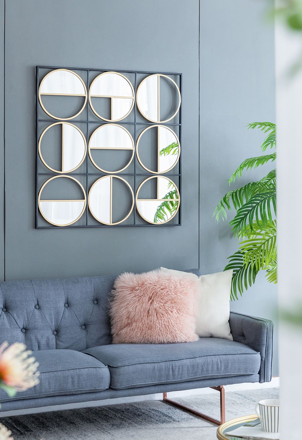 Contemporary black wall mirror in bedroom