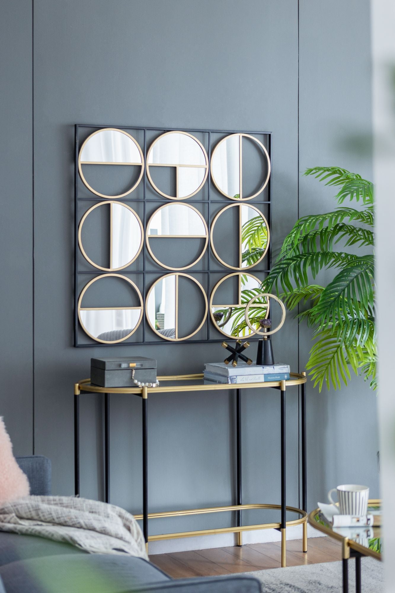 Eclectic metal beaded black wall mirror angled view