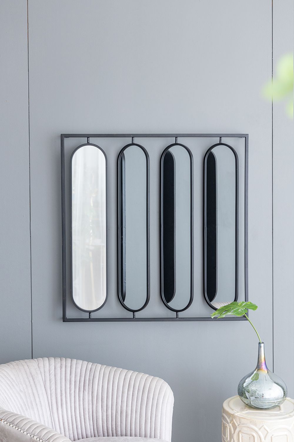 36x36 oval swivel mirror black frame angled view