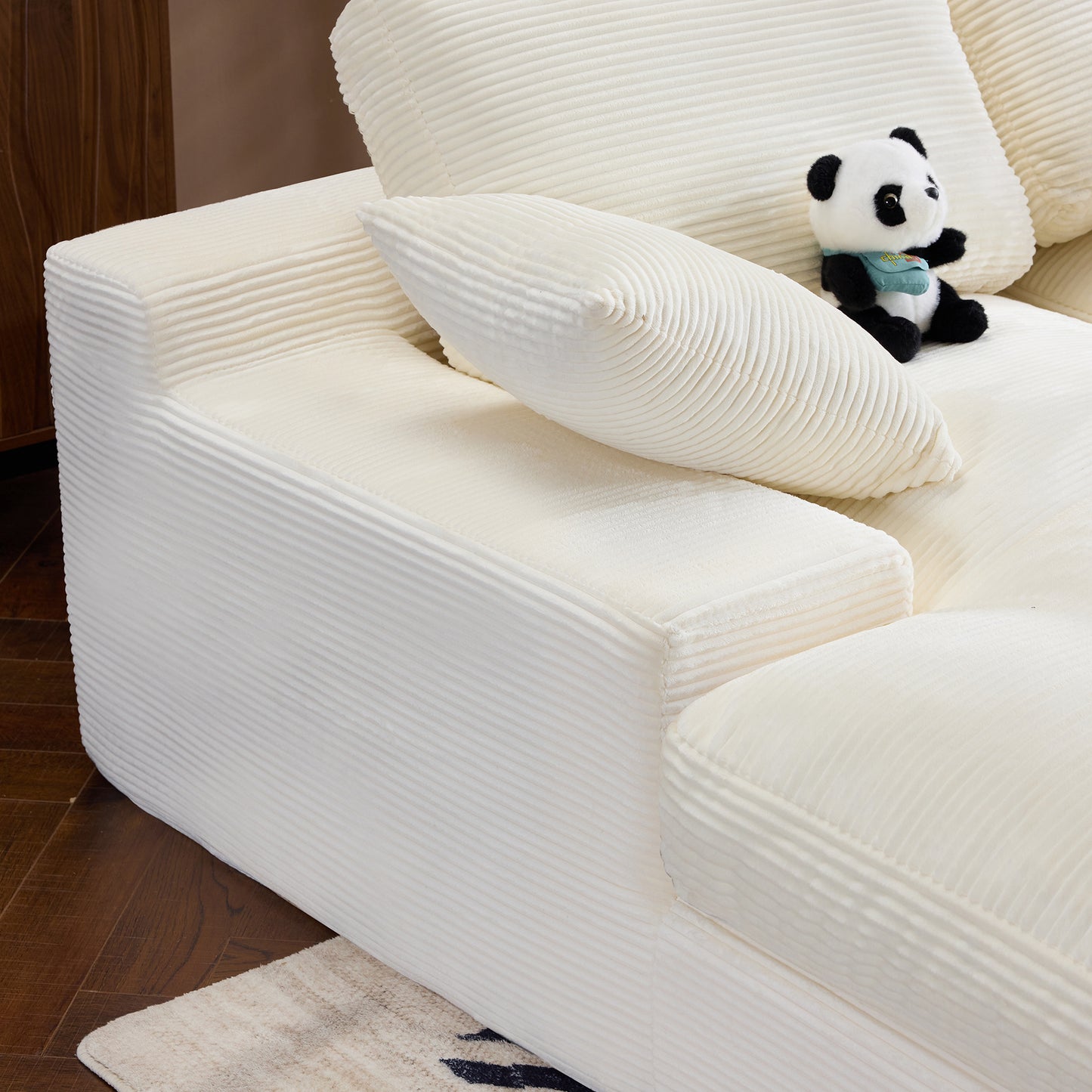 White corduroy compressed sofa. It has a soft and skin-friendly sitting feel, adding a healing atmosphere to the warm living room. It comes with 3 back cushions and 2 throw pillows. image 9