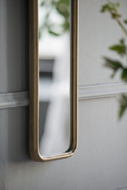 Narrow full length mirror with gold frame for living room