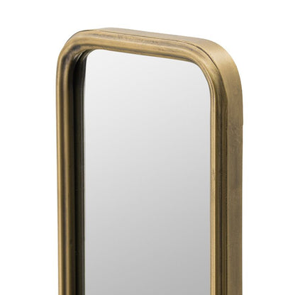 Full length mirror with antique gold frame in hallway setting