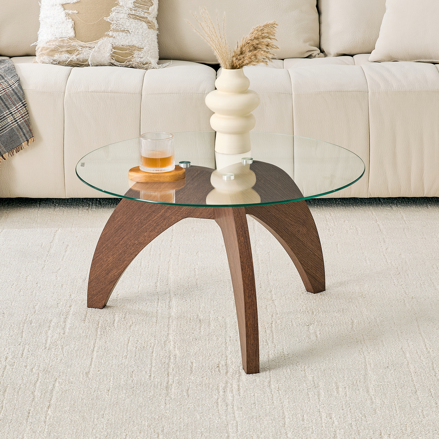Creative claw-style triangular-leg round coffee table, approximately 27.5 inches in diameter, featuring a clear tempered glass top and walnut-colored MDF. Perfect as a living room coffee table,etc. image 1