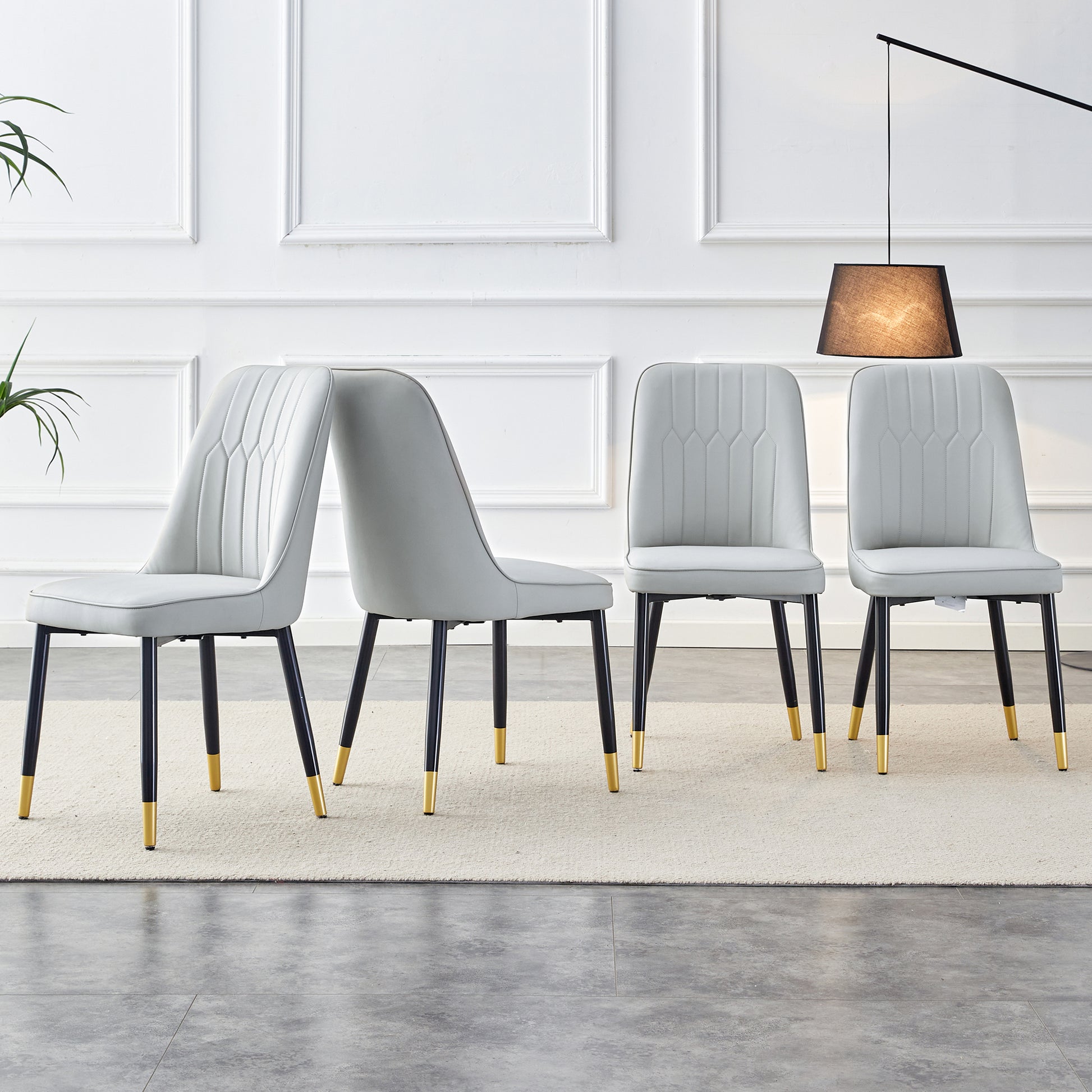 Modern dining chairs are equipped with light gray PU artificial leather backrest cushions and black metal legs, suitable for restaurants,kitchens,and bedrooms.Set of 4pieces (light gray+PU) image 1