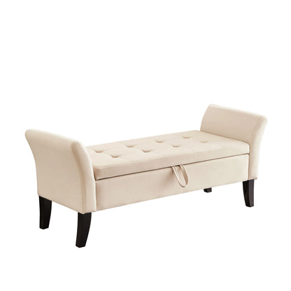 Beige velvet bench placed at foot of bed in bedroom