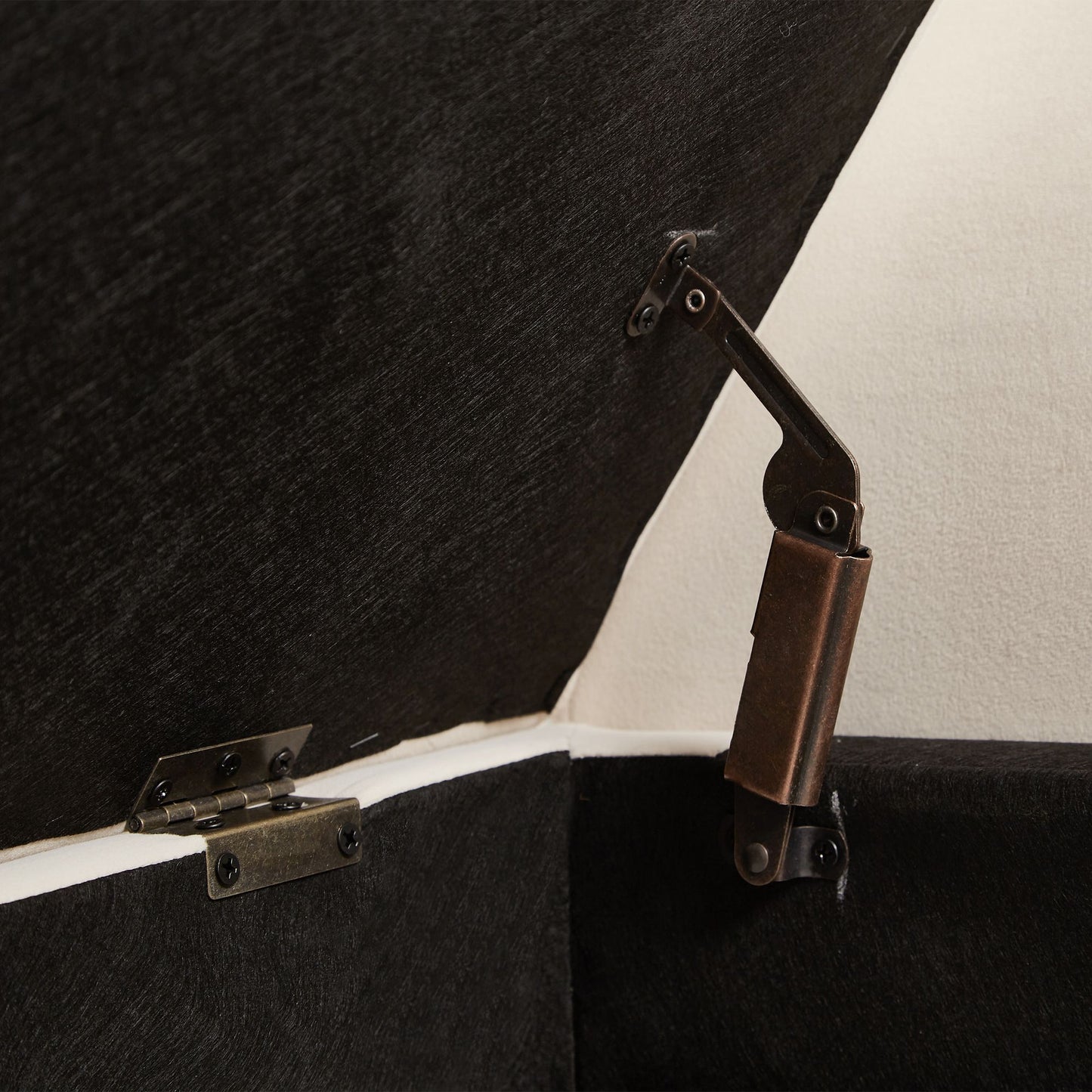 Close-up of tufted velvet fabric on storage bench