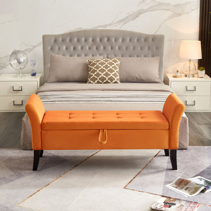 Close up of tufted orange velvet fabric on storage bench