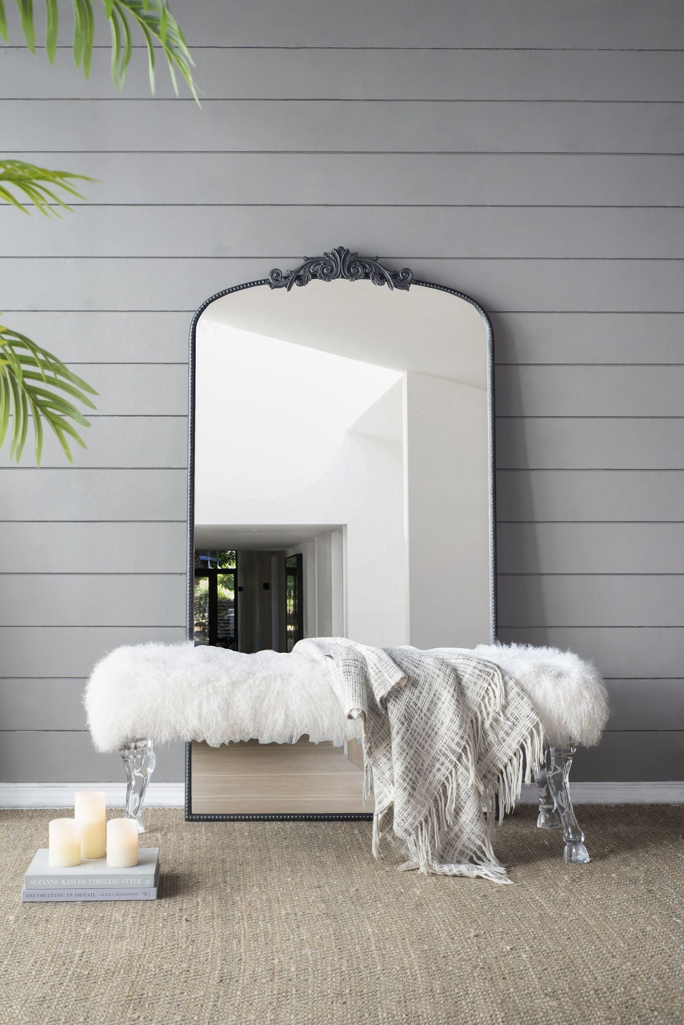Black full length mirror hanging on wall bedroom