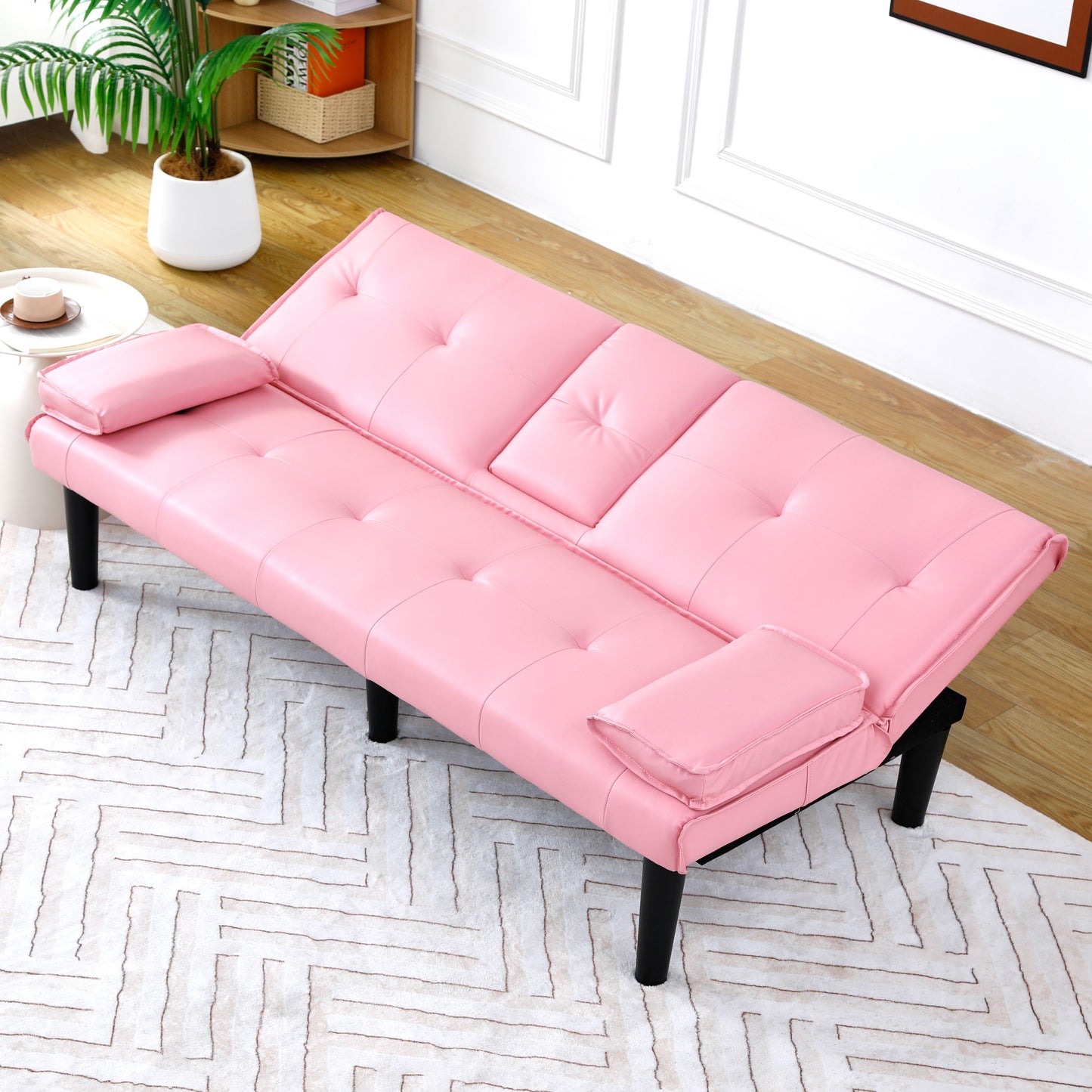 The 67-inch pink PVC multi-functional sofa bed, with a foldable and cup holder design, makes it extremely convenient to turn the living room into a guest room image 5