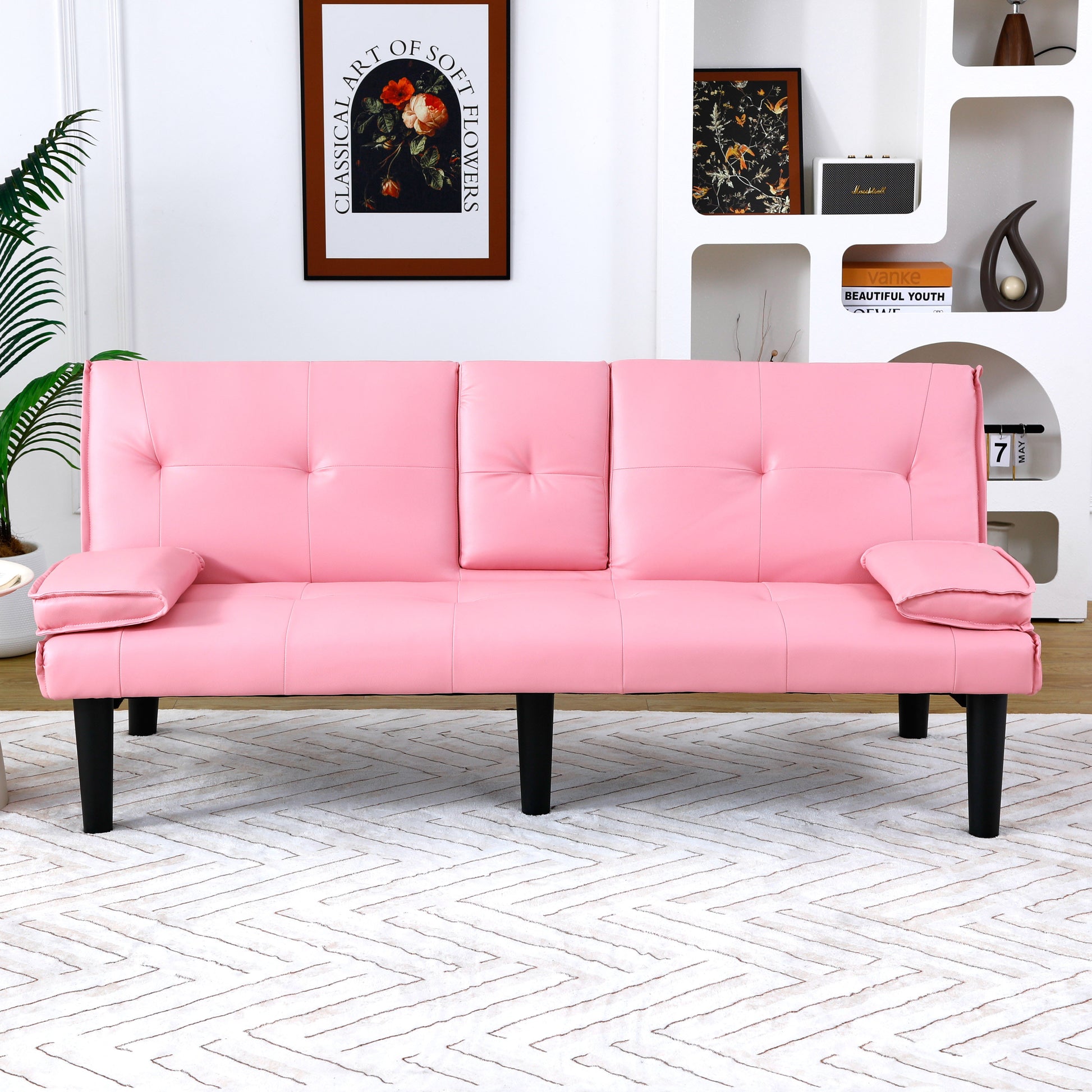 The 67-inch pink PVC multi-functional sofa bed, with a foldable and cup holder design, makes it extremely convenient to turn the living room into a guest room image 3