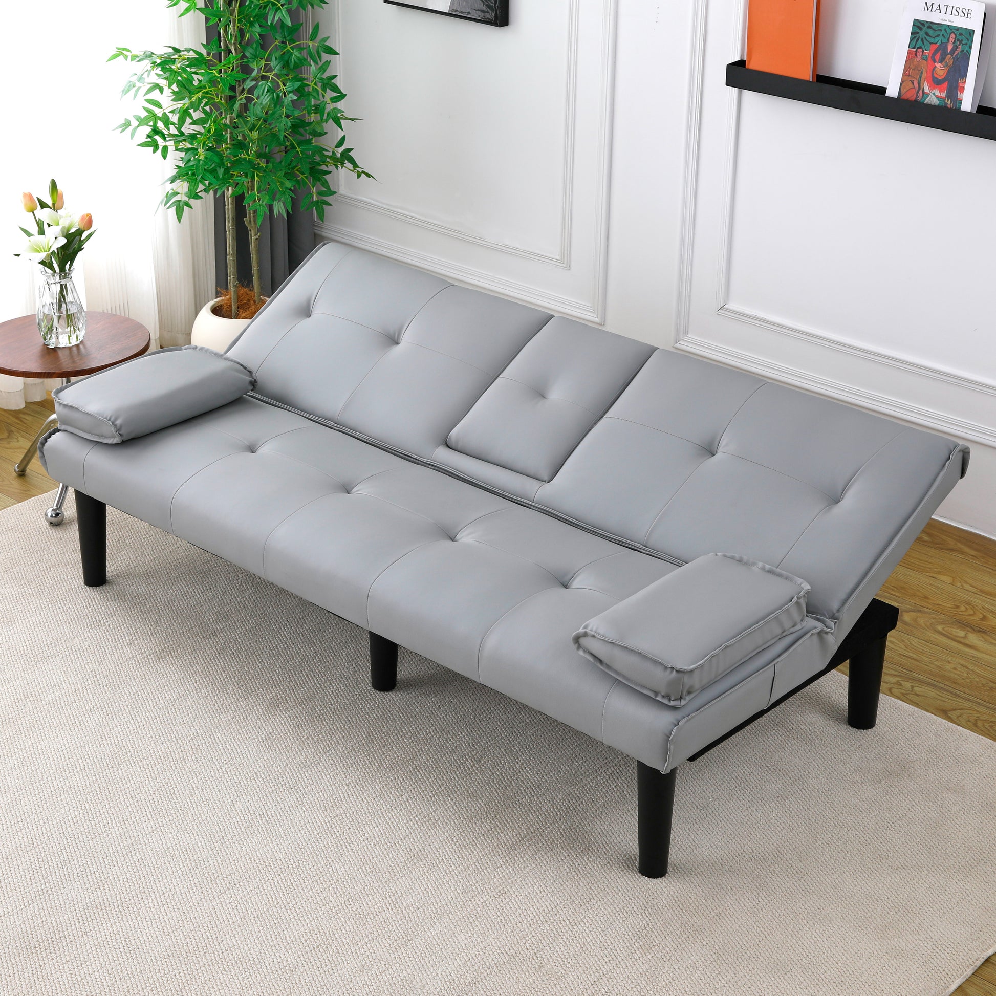 The 67-inch light gray PVC multi-functional sofa bed, with a foldable and cup holder design, makes it extremely convenient to turn the living room into a guest room image 8