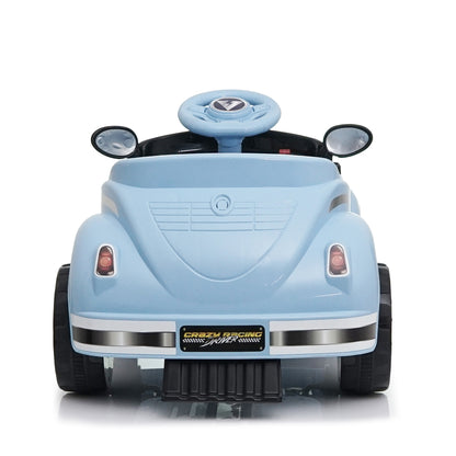 Child driving 12V vintage ride on car with remote control supervision