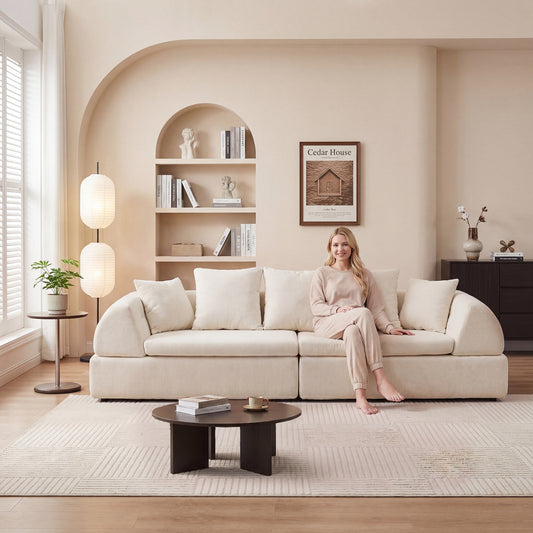 Cloud Modular Sectional Sofa in white with deep fluffy seat and ottoman