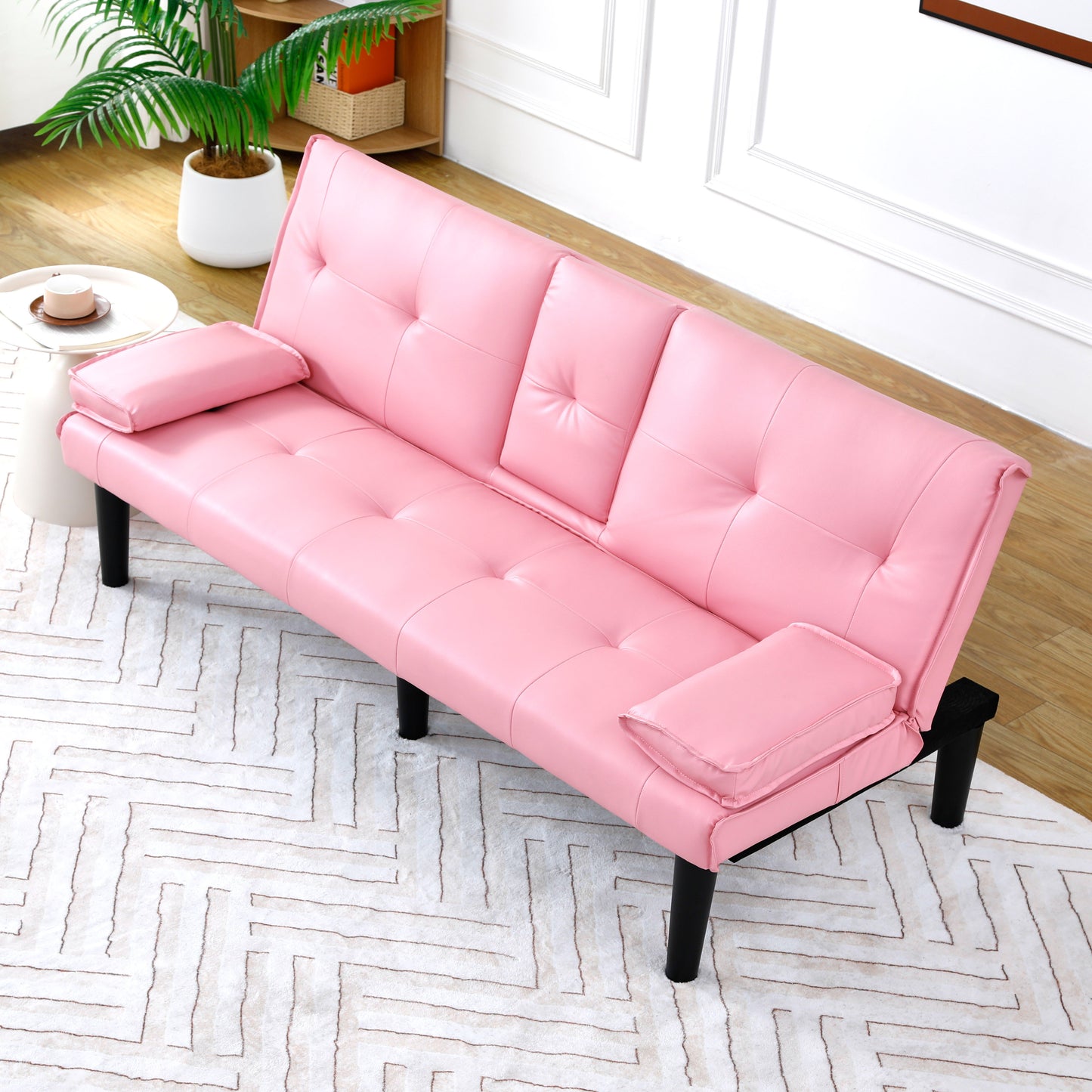 The 67-inch pink PVC multi-functional sofa bed, with a foldable and cup holder design, makes it extremely convenient to turn the living room into a guest room image 4