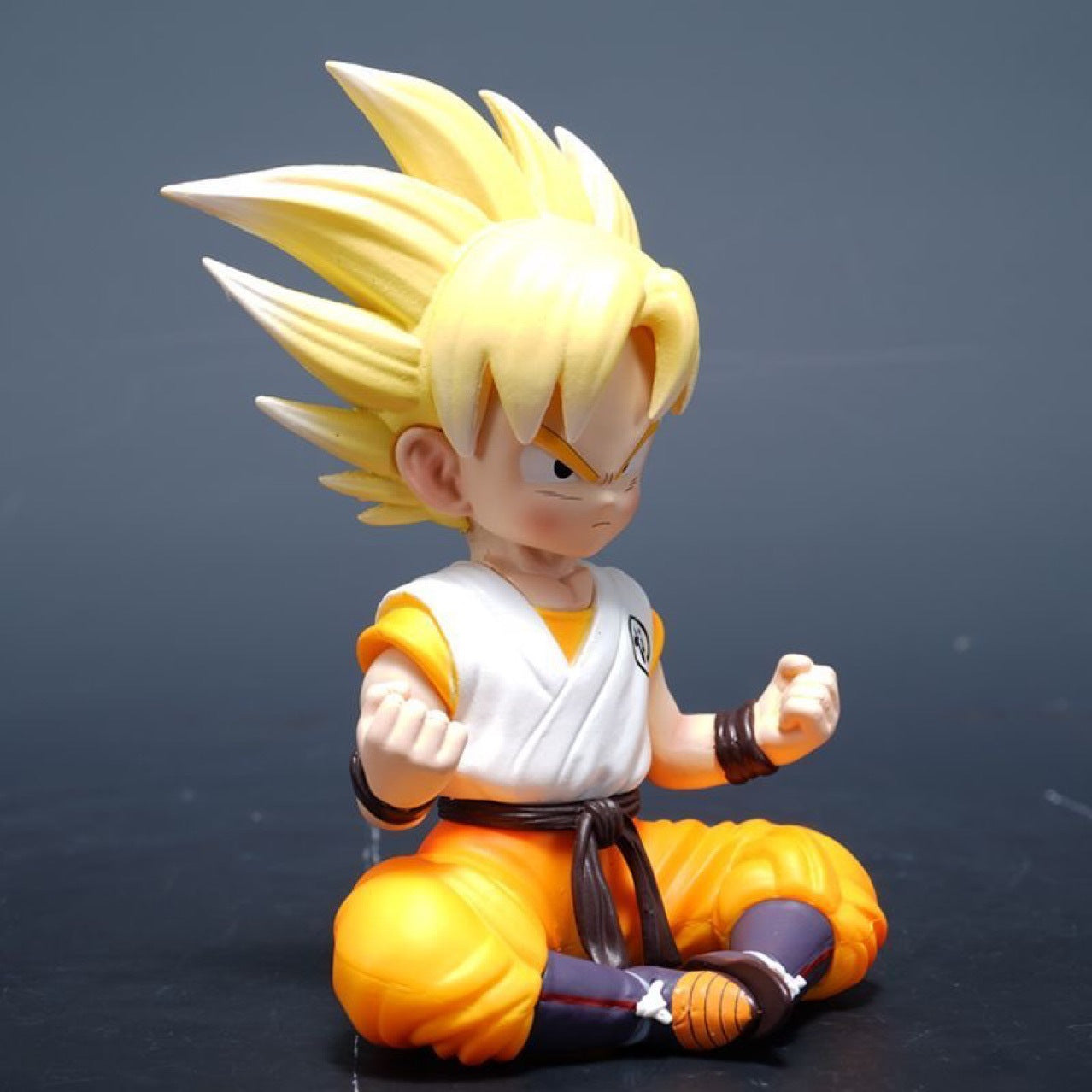Dragon Ball Kid Goku Sitting Figure, Super Saiyan, Premium Version