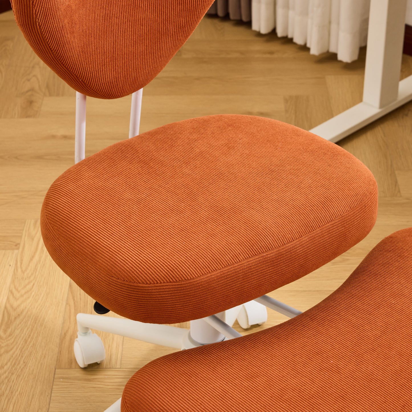 Meditation chair, an ergonomic cross-legged seating chair with lumbar support and a height-adjustable seat cushion, ideal for people engaged in high-intensity office work. ORANGE image 11