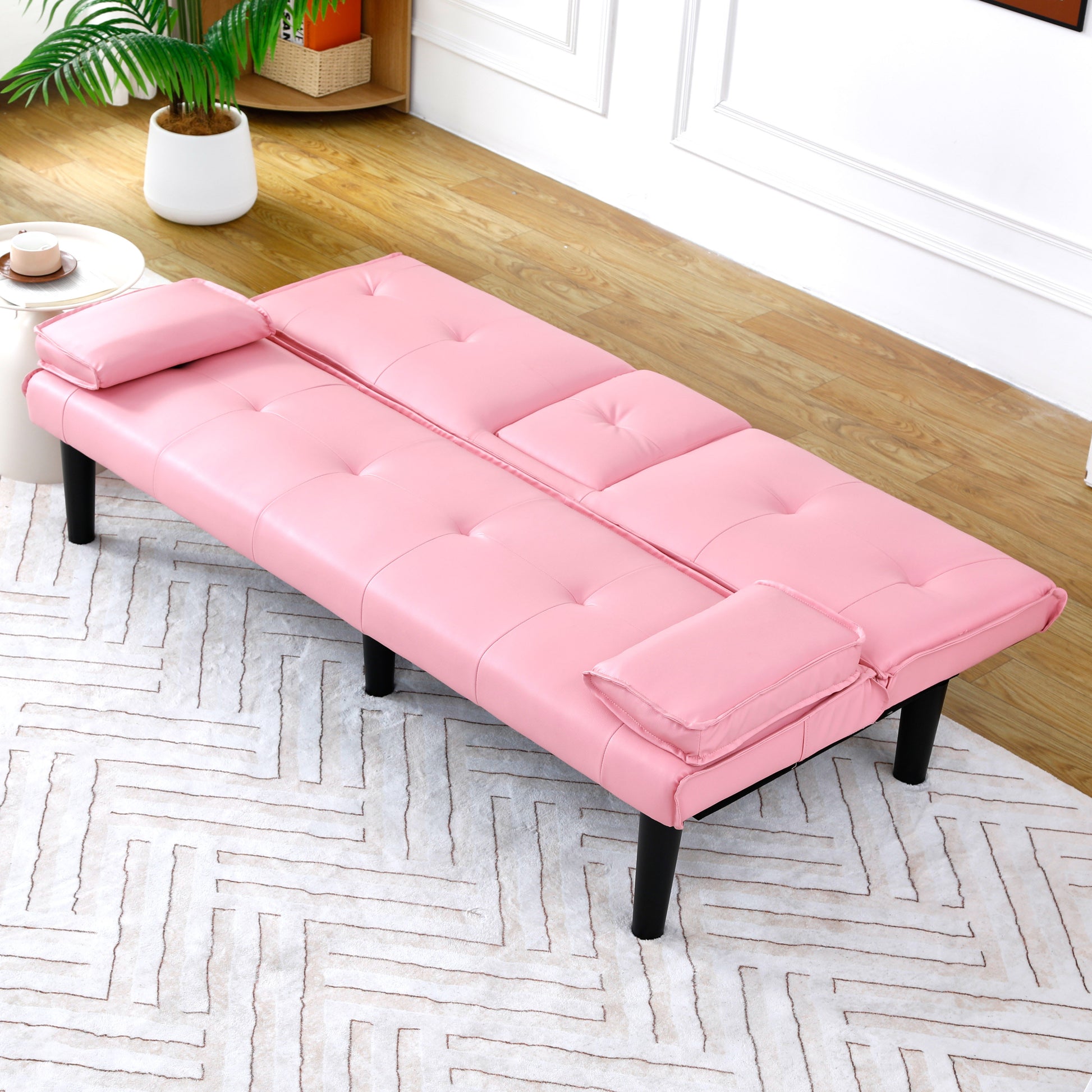 The 67-inch pink PVC multi-functional sofa bed, with a foldable and cup holder design, makes it extremely convenient to turn the living room into a guest room image 6