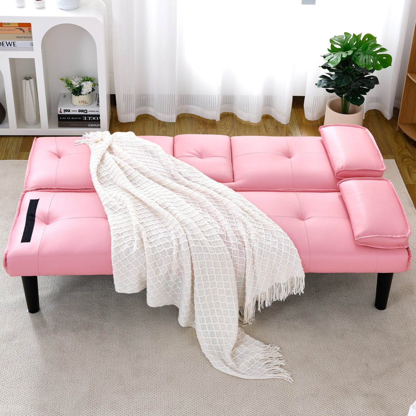 The 67-inch pink PVC multi-functional sofa bed, with a foldable and cup holder design, makes it extremely convenient to turn the living room into a guest room image 8